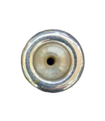 A close-up top-down view of a trumpet mouthpiece with a central hole, showing a polished silver-toned rim