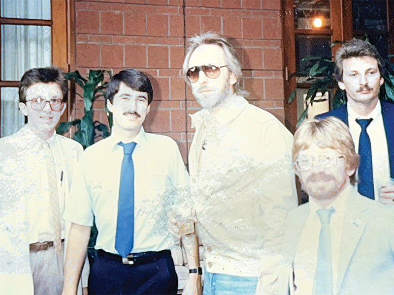Vintage George’s Music staff photo from early years of the company