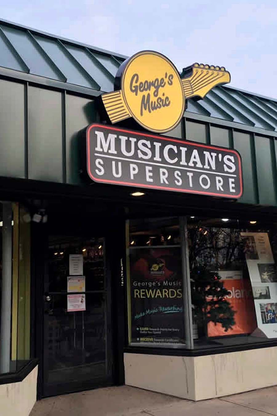 The front entrance of a George's Music store.
