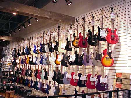 Guitar and Bass instruments wall at George's Music Store in North Wales, PA