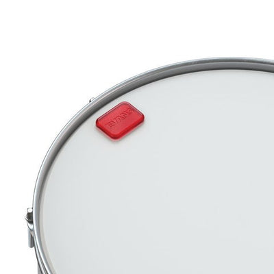 Evans EQ PODS Drum Damper Gels red pad on drumhead, front-angled view