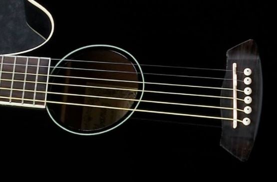 Ibanez TCY10EBK Talman Acoustic-Electric Cutaway Black, close-up of soundhole and bridge detail